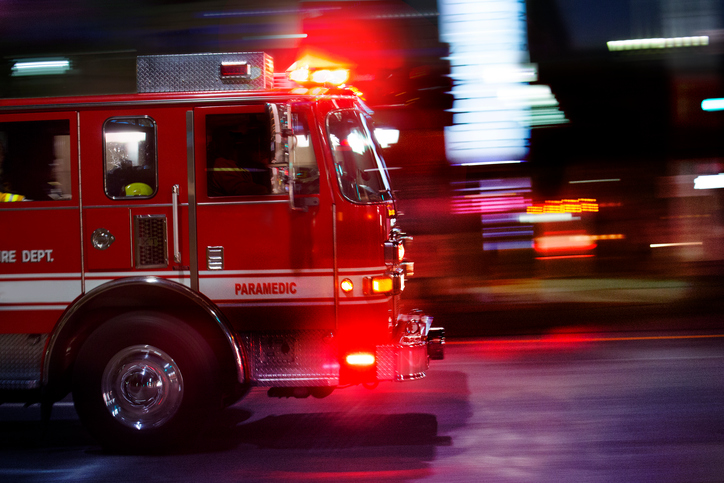 A fire engine races to the scene of an emergency.