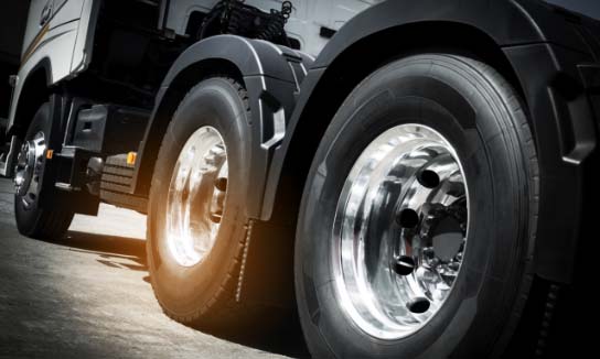 image focused on 18 wheeler's wheels.