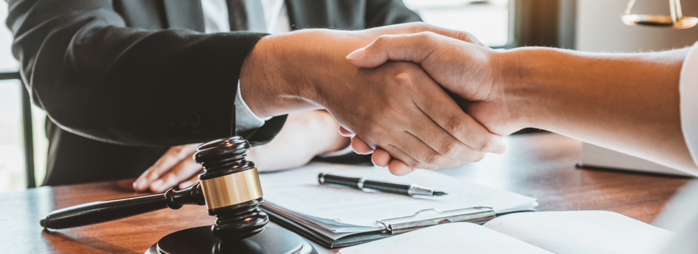 Businessman shaking hands to seal a deal