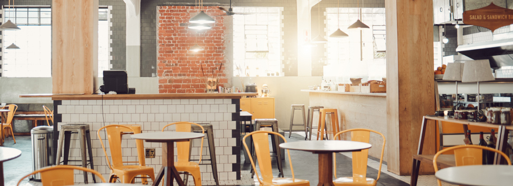 Interior of empty modern restaurant during the day